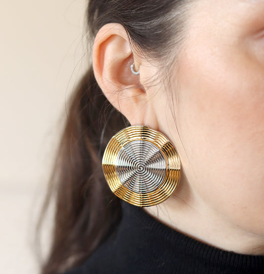 dual toned circular spiral design statement earrings. Celeste Spiral Earrings - waterproof 18K gold sculptural statement earrings