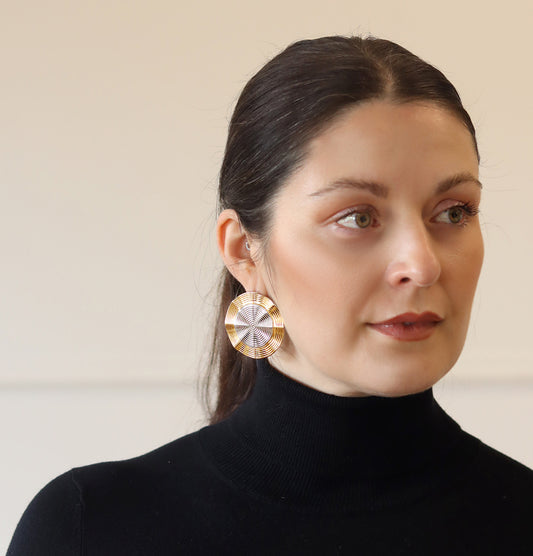 dual toned circular spiral design statement earrings. Celeste Spiral Earrings - waterproof 18K gold sculptural statement earrings
