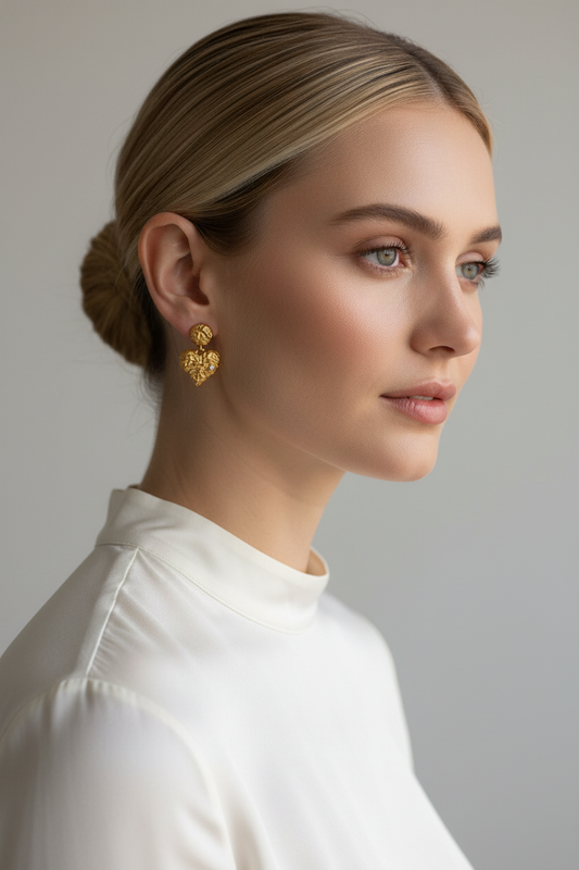 Irregular Heart Earring With Clear Stone on blonde Caucasian model with face showing