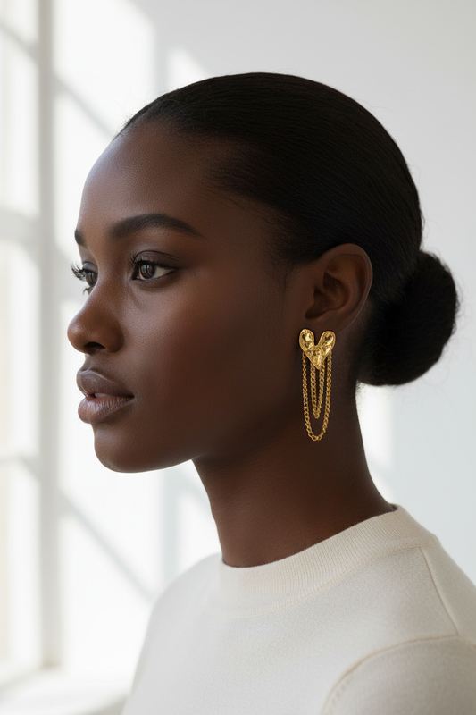 Luxe Amor Golden Heart Chain Earrings on Black model