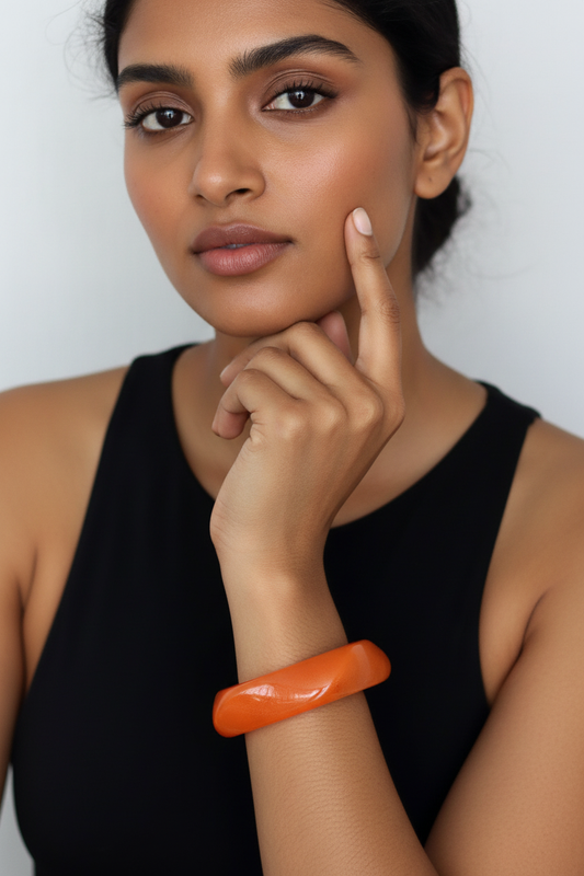 Orange bangle editorial portrait 